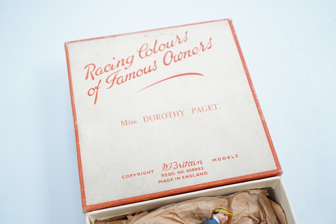 Two boxed Britains Racing Colours of Famous Owners series lead mounted figures; Miss Dorothy Paget - rider in yellow-striped blue jersey on a grey horse, and Msr. M. Boussac - rider in orange jersey on a dark brown horse